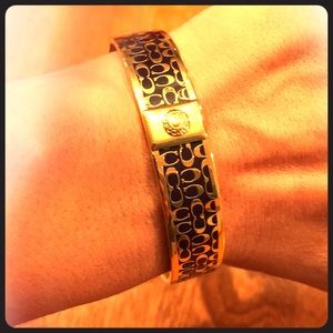 Coach bracelet—- dark purple and gold